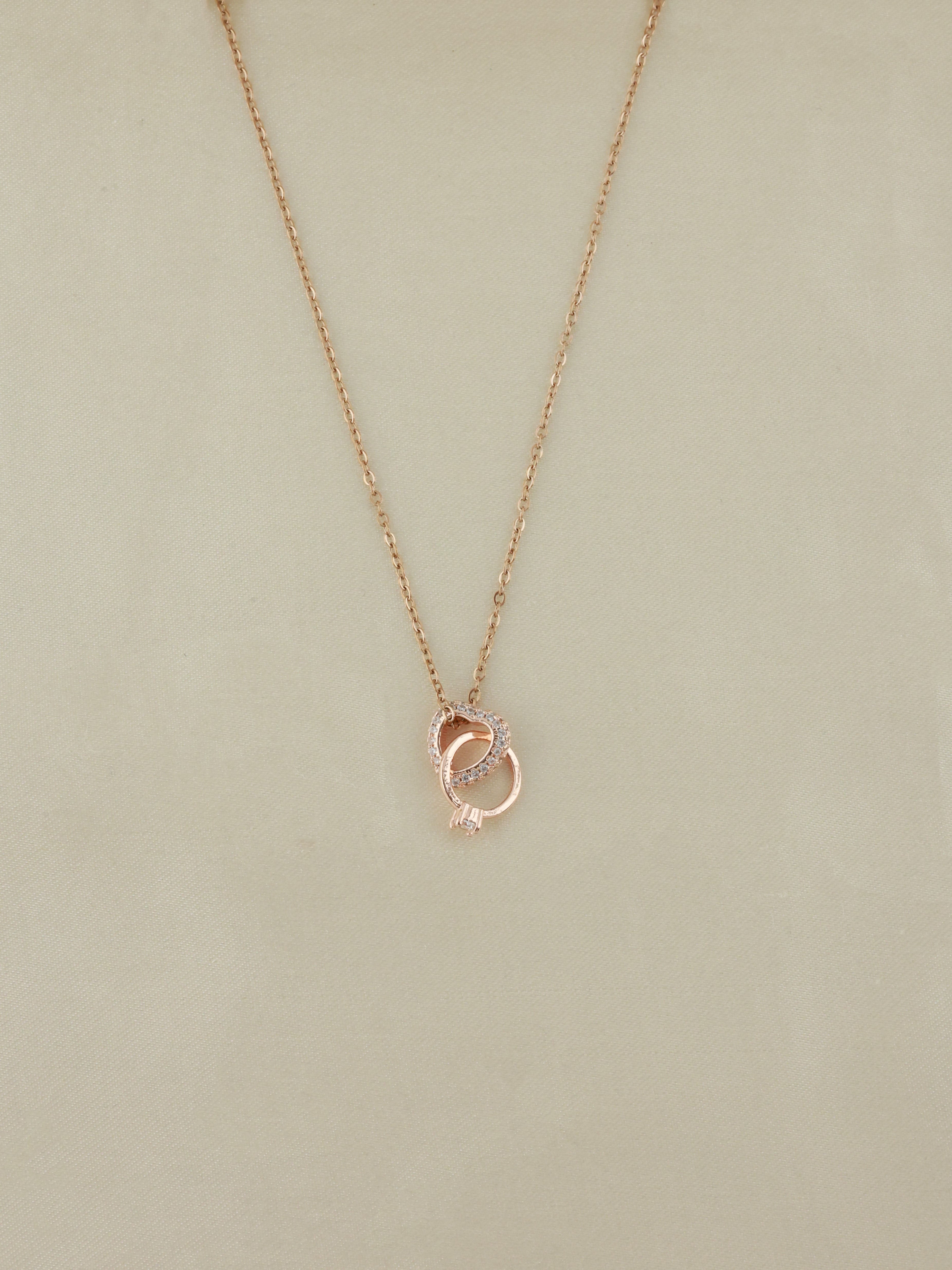 Interlocking Ring & Heart Pendant