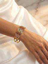Elegant Gold Mirage Bangle with Triple Sparkle Rows - Doulaat