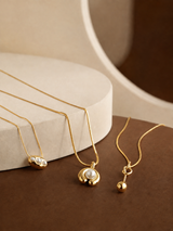 Gold Sculpted Pearl & Sphere Collection