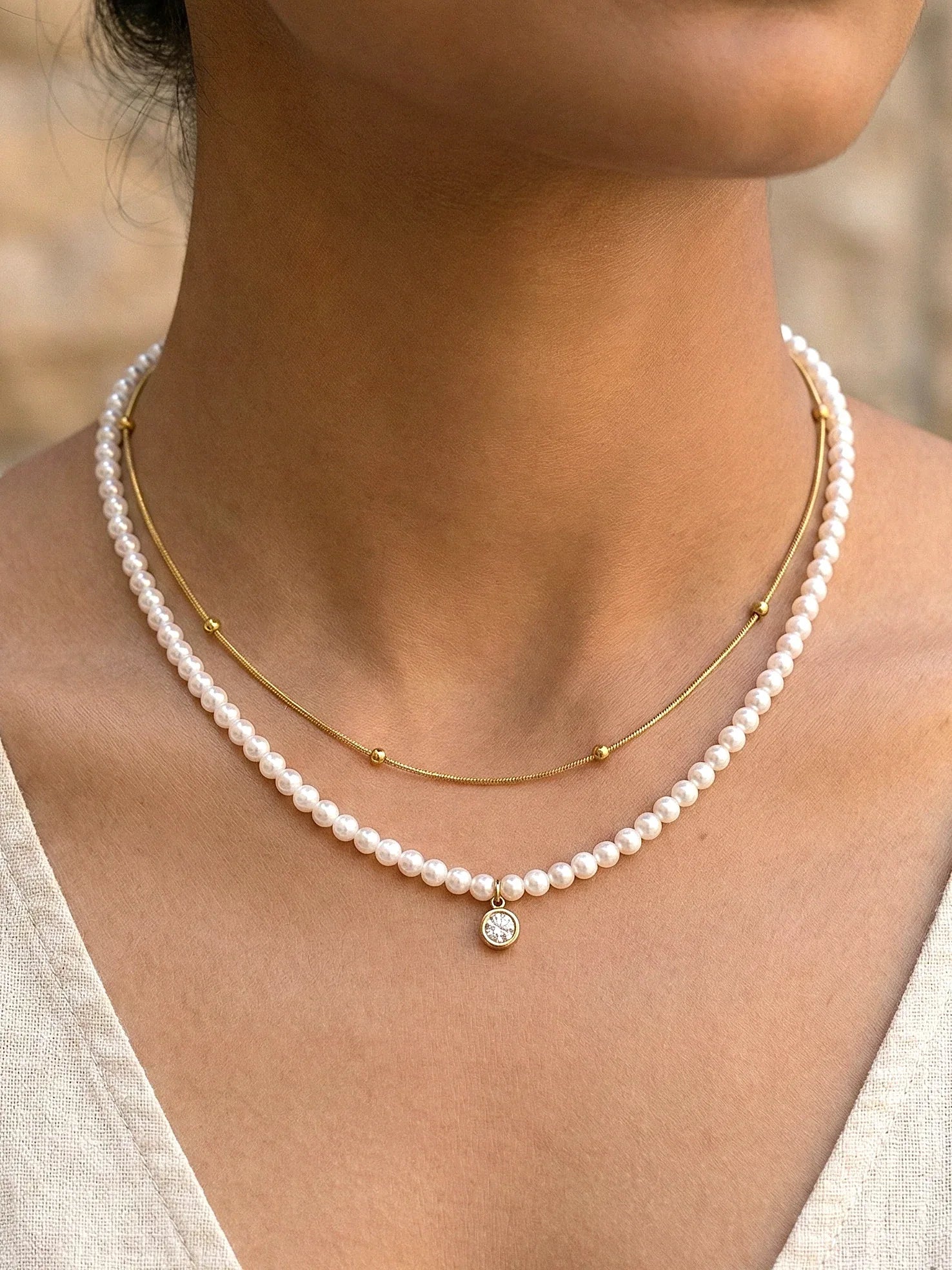 Gold Layered Pearl & Crystal Charm Necklace - Doulaat