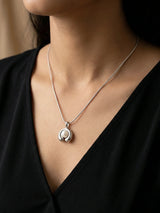 Sleek Gold Snake Chain Necklace with Round Pearl Charm - Doulaat