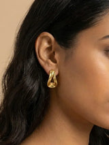 Golden Hugger Stud Earrings Soft Curved Minimal Shape - Doulaat