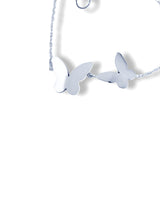 Elegant Silver Butterfly Bracelet with Soft Pearl Shine