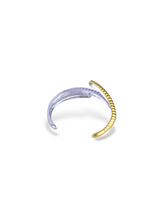Stylish Two-Tone Aure Bangle with an Adjustable Design