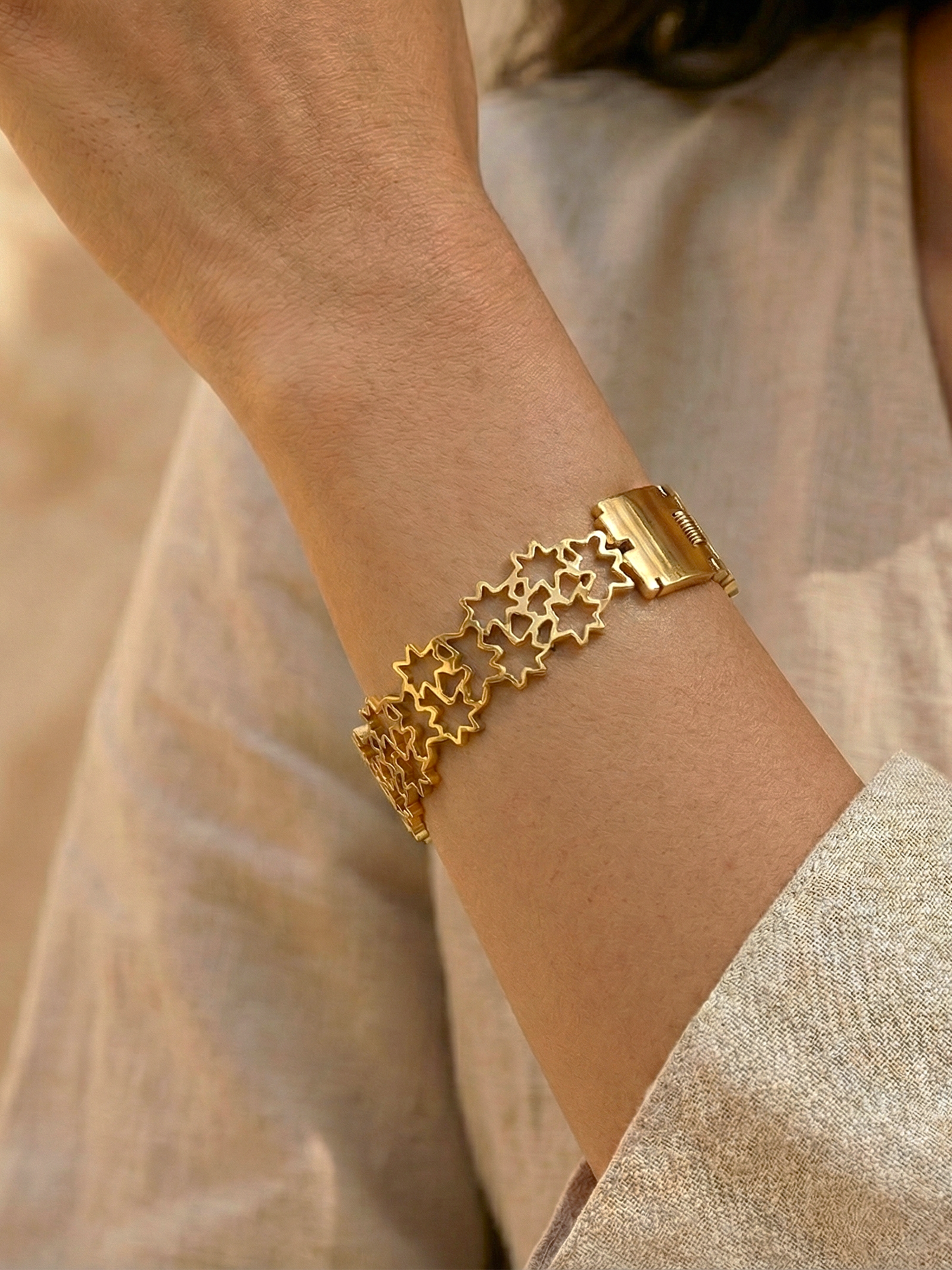 Sunswell Bangle - Elegant Gold Cutout Bracelet