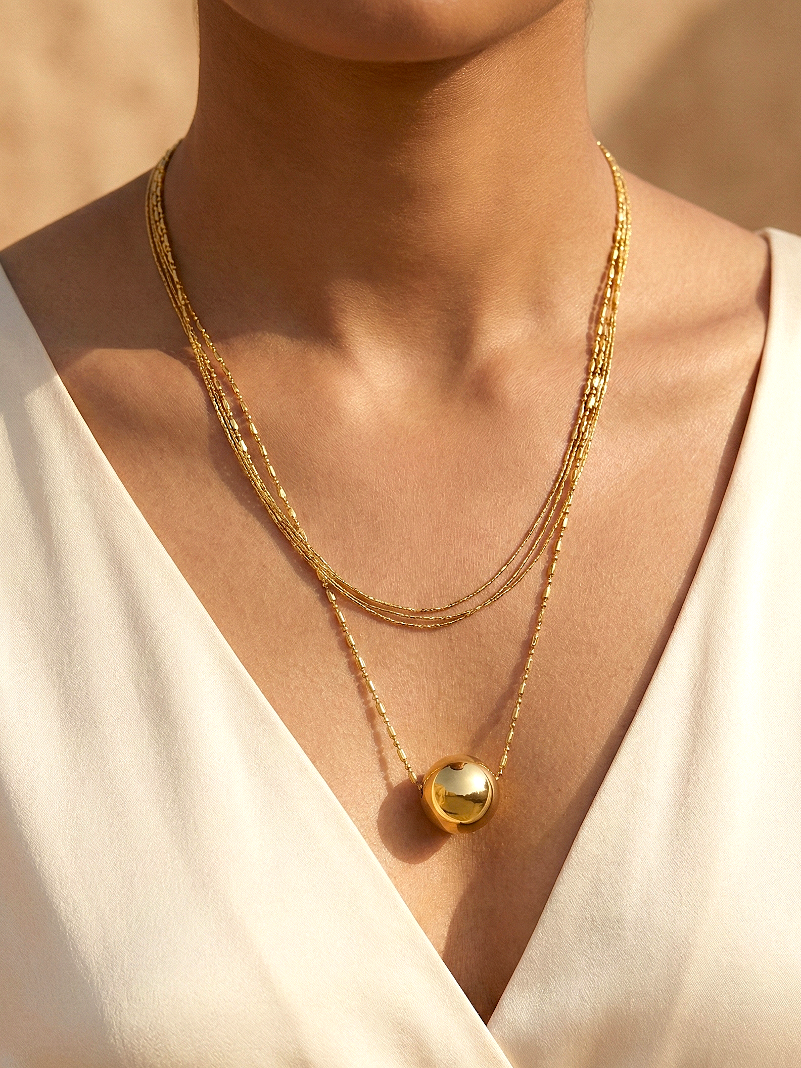 Stylish Gold Layered Chain Necklace with Round Bead