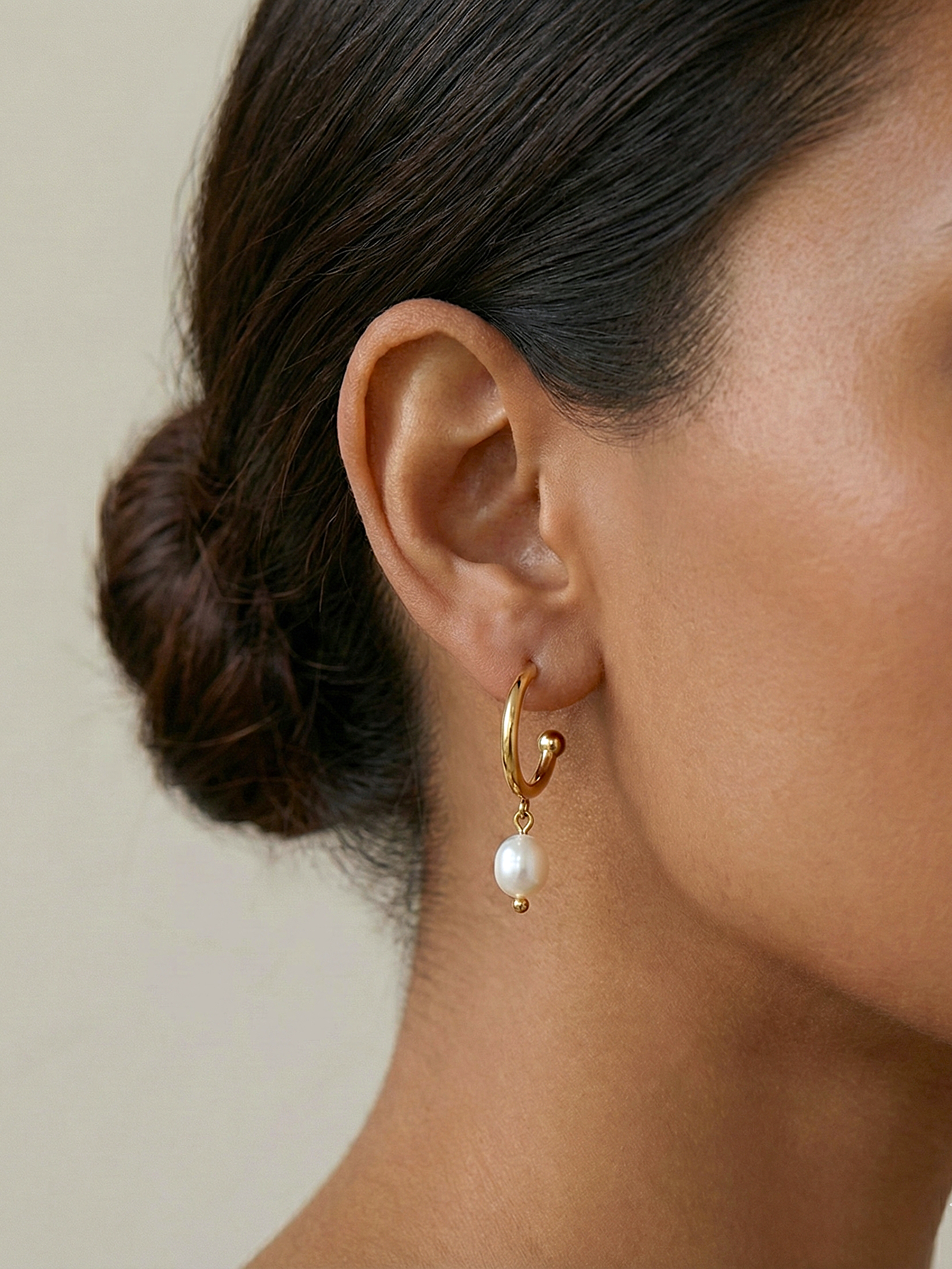 Fluid Folds Gold Hoop Earrings with Soft Pearl Drop