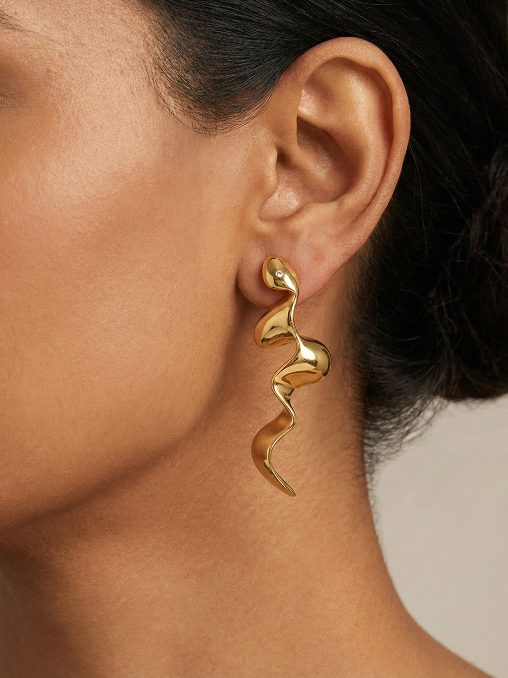 Gold Torsion Drop Earrings with Fluid Shape